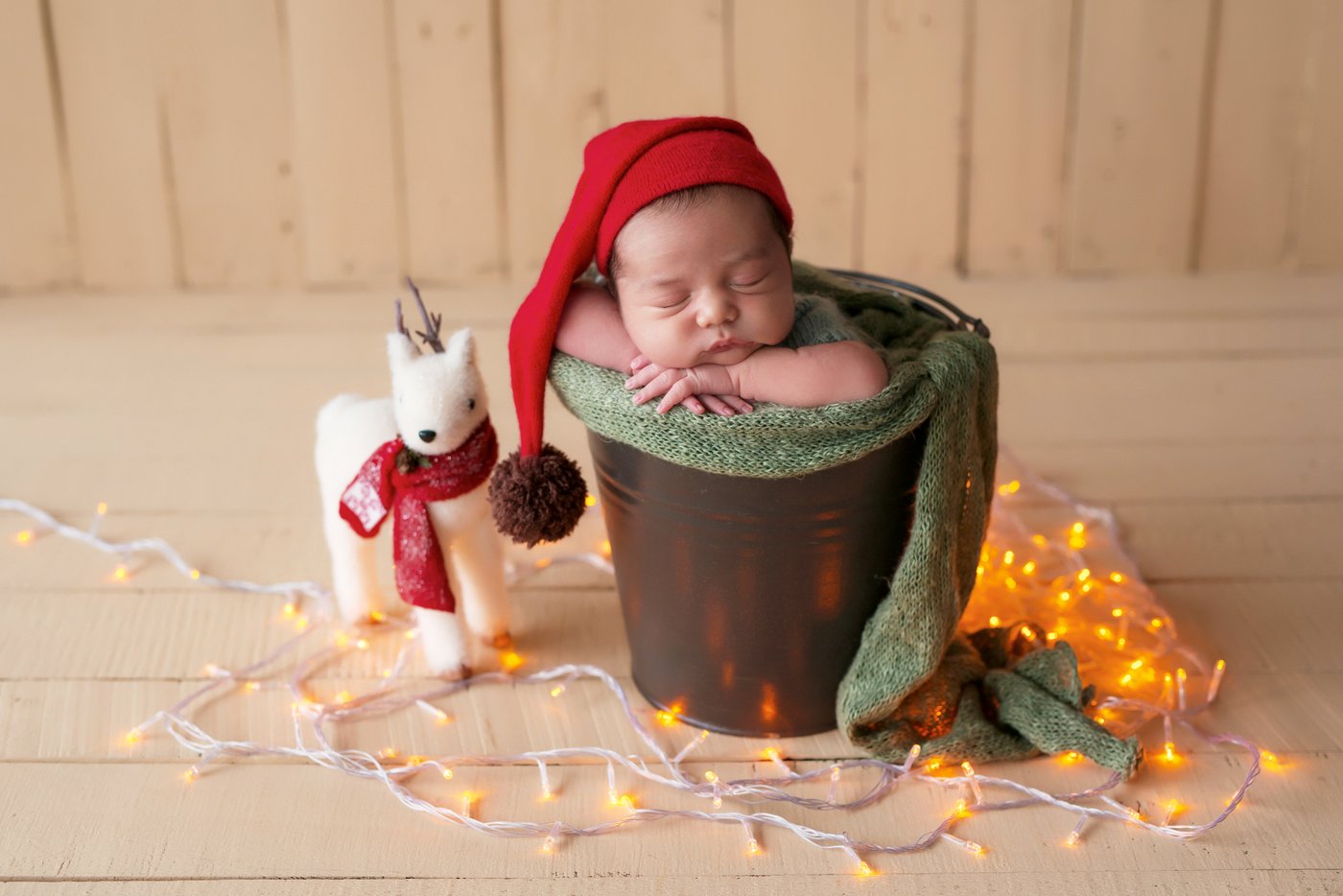 Sleeping newborn baby at Christmas