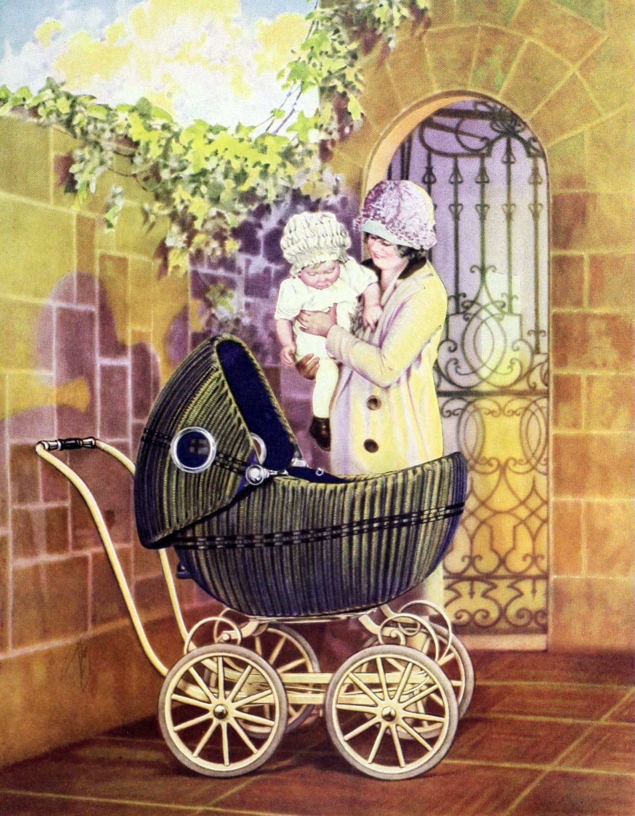 Vintage 1920s mother and baby with a baby carriage